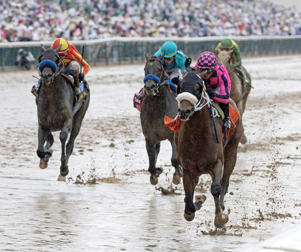 Macho Music - Pat Day Mile G2 - Barbara D. Livingston - Daily Racing Form